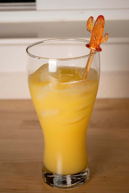 Agent Orange is a simple yet delicious mix of vodka, Grand Marnier and orange juice.