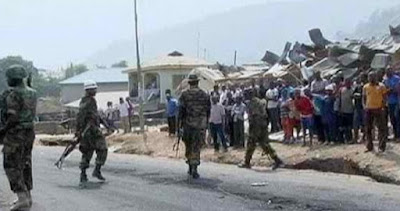 boko haram burn down military base bama