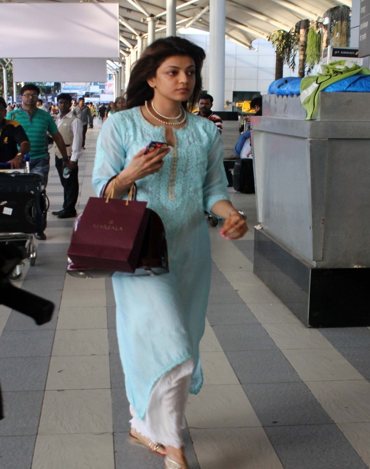 Kajal Agarwal At Airport Without MakeUp Face Stills In Blue Dress