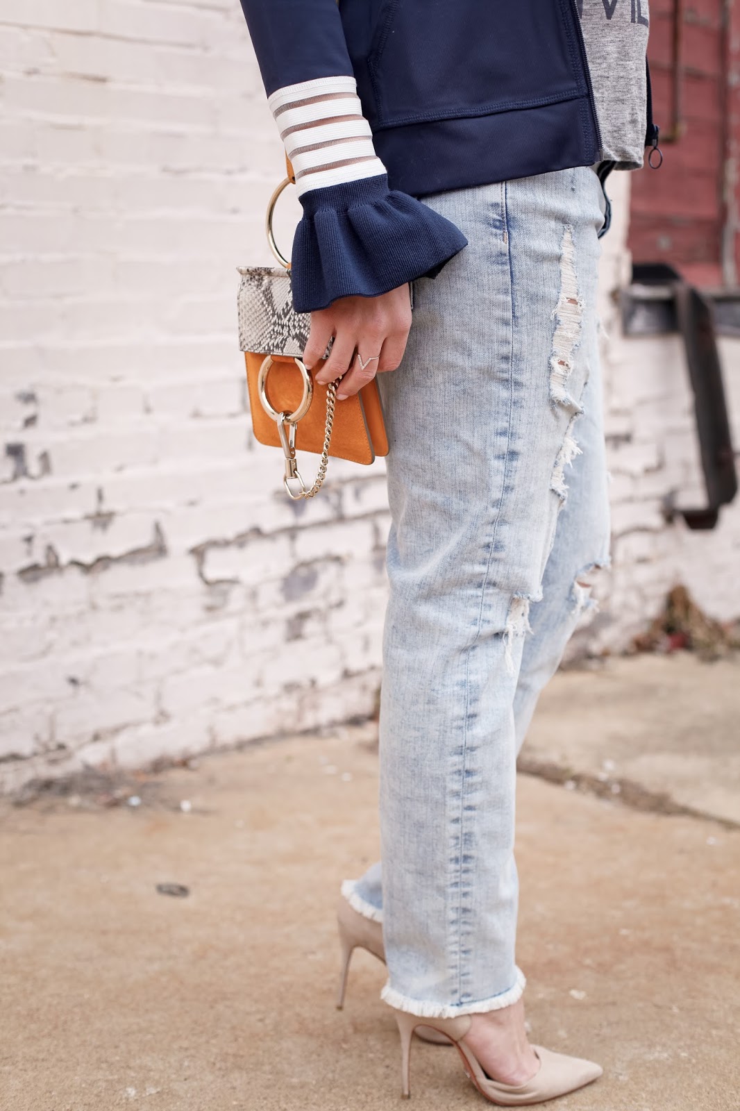Modern Way To Wear A Track Jacket Ruffle sleeve track jacket.