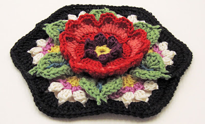 Crochet flower, hexie-shaped block made by Robin Atkins Crochet flower, hexie-shaped block made by Robin Atkins