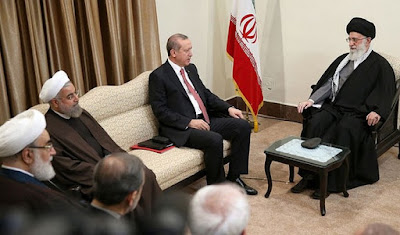 Hassan Rouhani (L), E. Erdogan (center), Ali Khamenei (R)