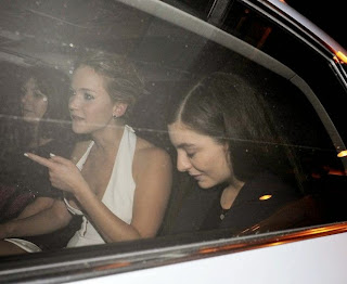 Inspiring! Jennifer Lawrence is all smiles as she arrived the Hunger Games after party in a magnificent long white gown.