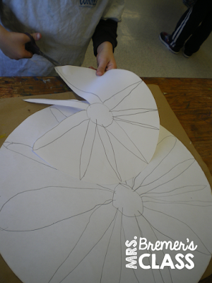 Spring art activity for Kindergarten- making flowers using warm and cool colors.