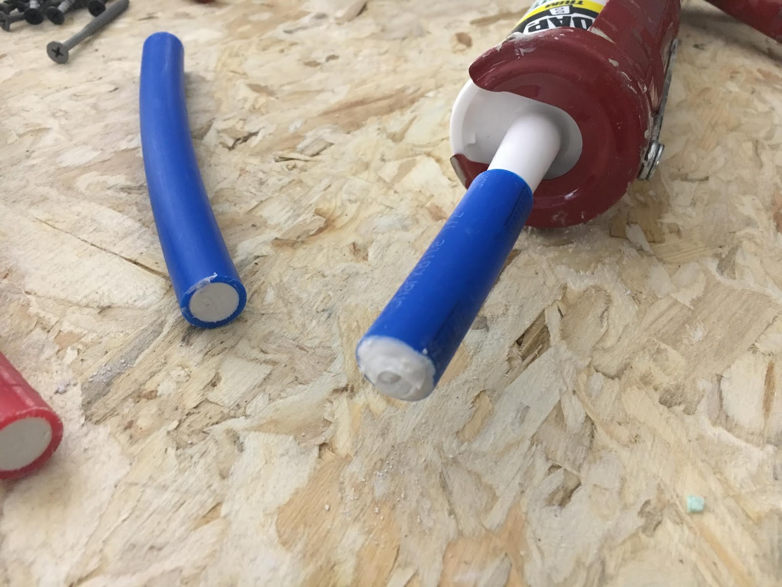 That's My Cloud Seal caulk tubes with PEX cutoff caps
