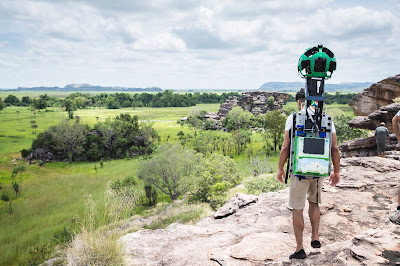 A photo of the Google Street View trekker backpack and man during the collect in Kakadu, with a beautiful view