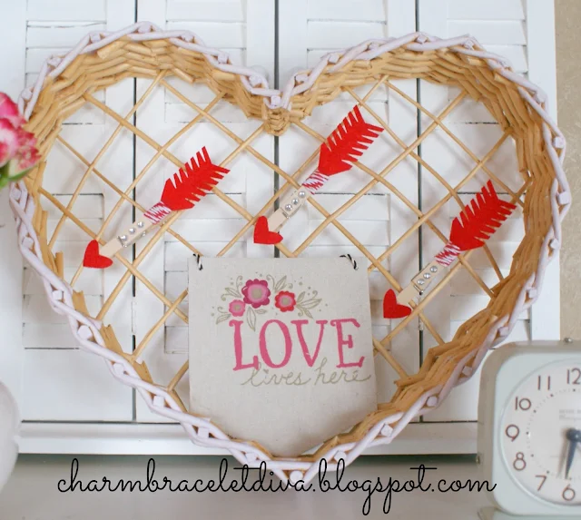 Vintage inspired Valentine's Day vignette with banner and roses