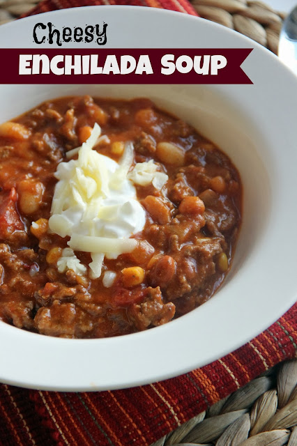 Cheesy Enchilada Soup - A delicious and hearty soup filled with ground beef, enchilada sauce, beans, tomatoes, and corn. It's a quick and easy one-pot supper too!