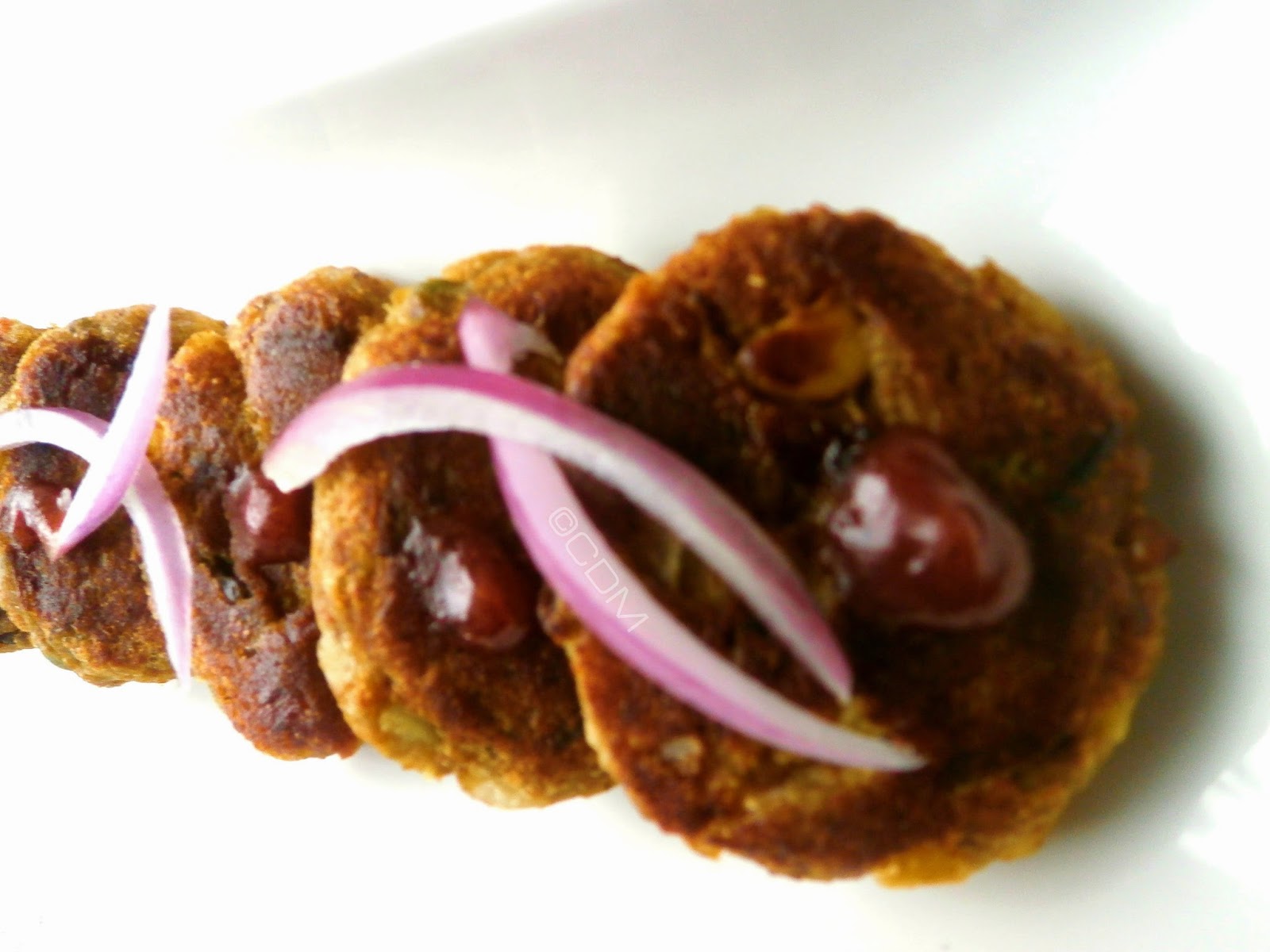 Kacha kela tikkiRaw Banana PattiesRaw Banana patty sandwich with