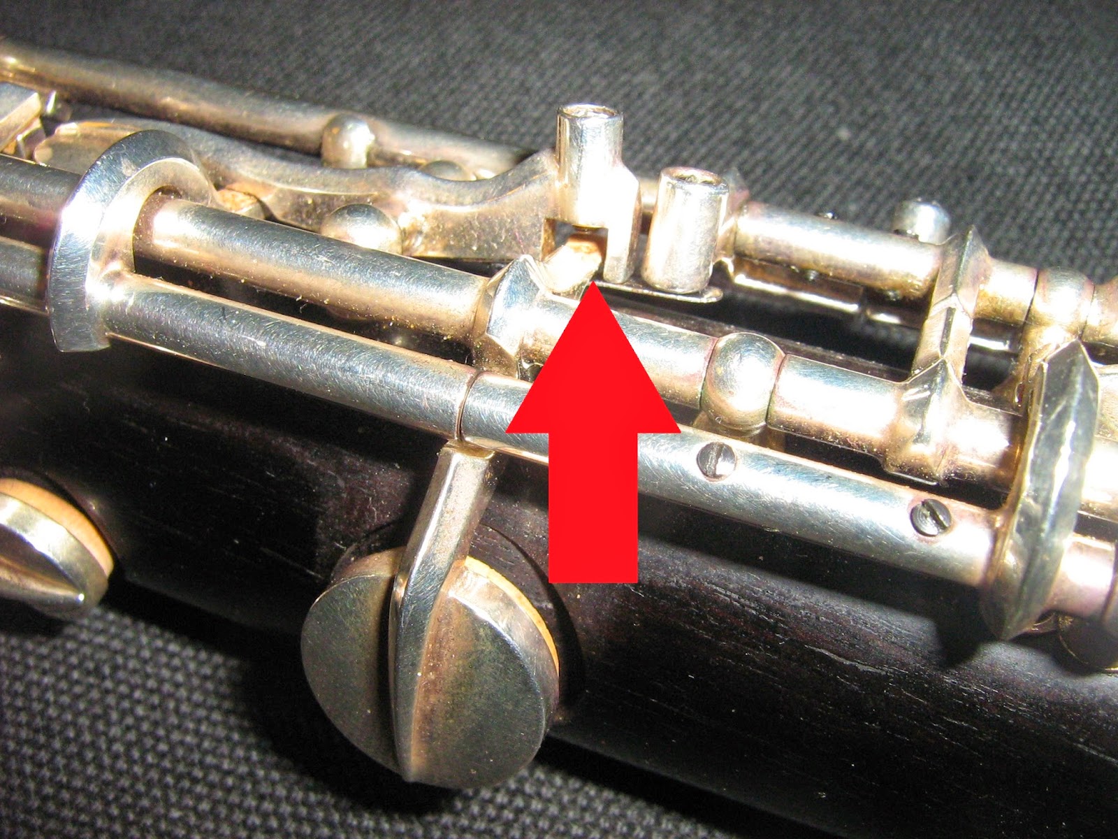 The Bench Keystone Regulating the Lower End of an Oboe