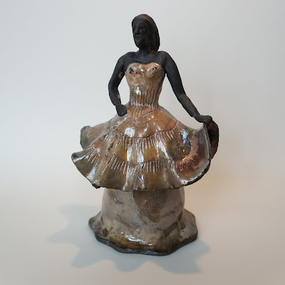 Beautiful lady raku fired pottery sculpture by Lily.