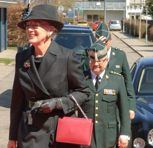 Princess Marie was in uniform, Queen Margrethe wore the charcoal grey trilby at 75th anniversary of DEMA Danish Emergency Management Agency