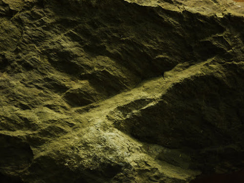 Rock texture photographed with incandescent relief lighting #3