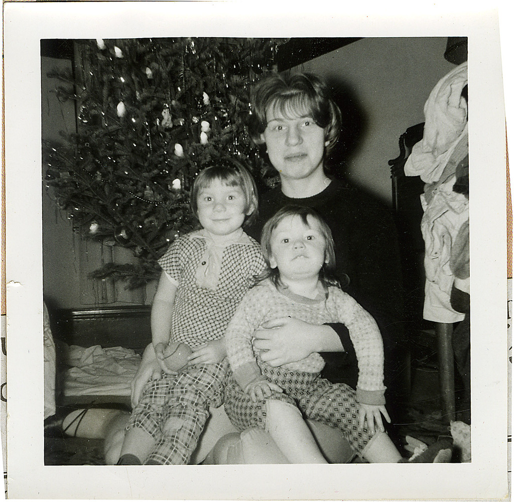This 1963 family photo shows Donna Willing, left, with her sisters, Susan and Barb at Christmas. Donna was raped and strangled in 1970.