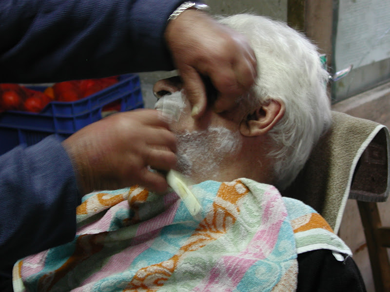 A traditional village barber Express Teach