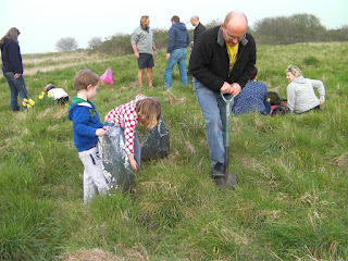 children planting seeds in reclaimed land off moorings way portsmouth