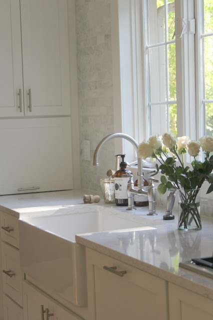 Modern farmhouse white kitchen with farm sink and Shaker cabinets by Hello Lovely Studio