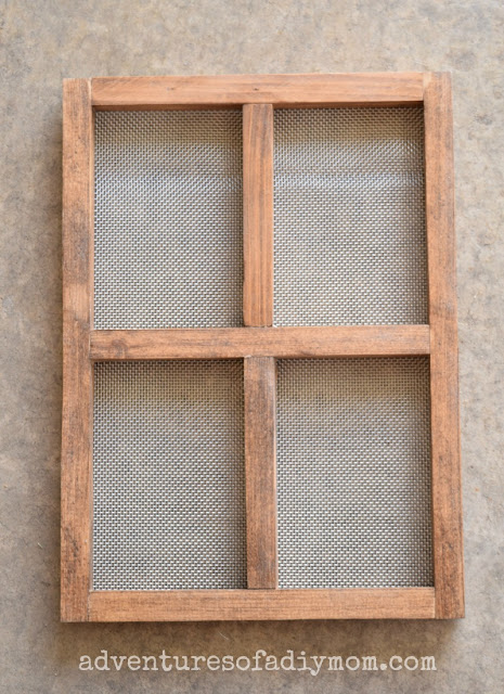 screen in "window" for hanging earrings
