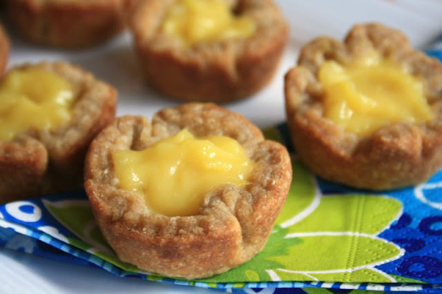 Mini lemon tarts made with whole wheat pastry are a wholesome treat.