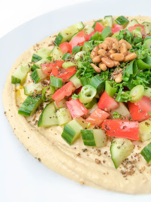 7 Layer Lebanese Hummus Dip Recipe toasted pine nuts and a drizzle of olive oil and za 7 Layer Lebanese Hummus Dip Recipe