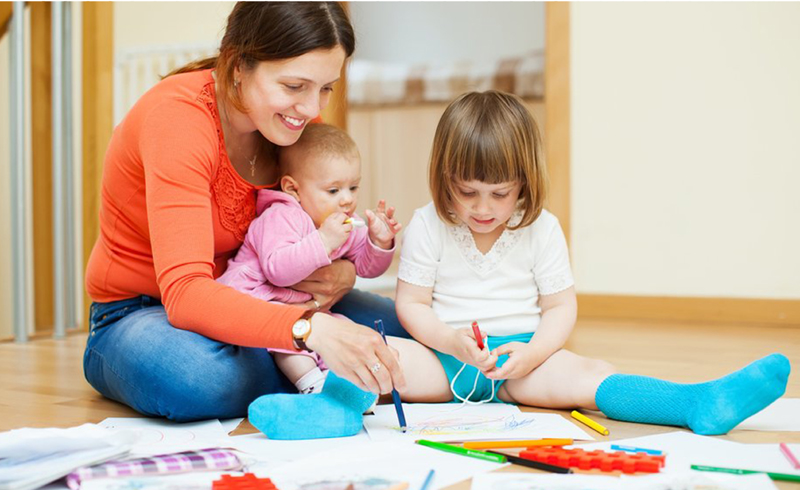 Mom playing with kids