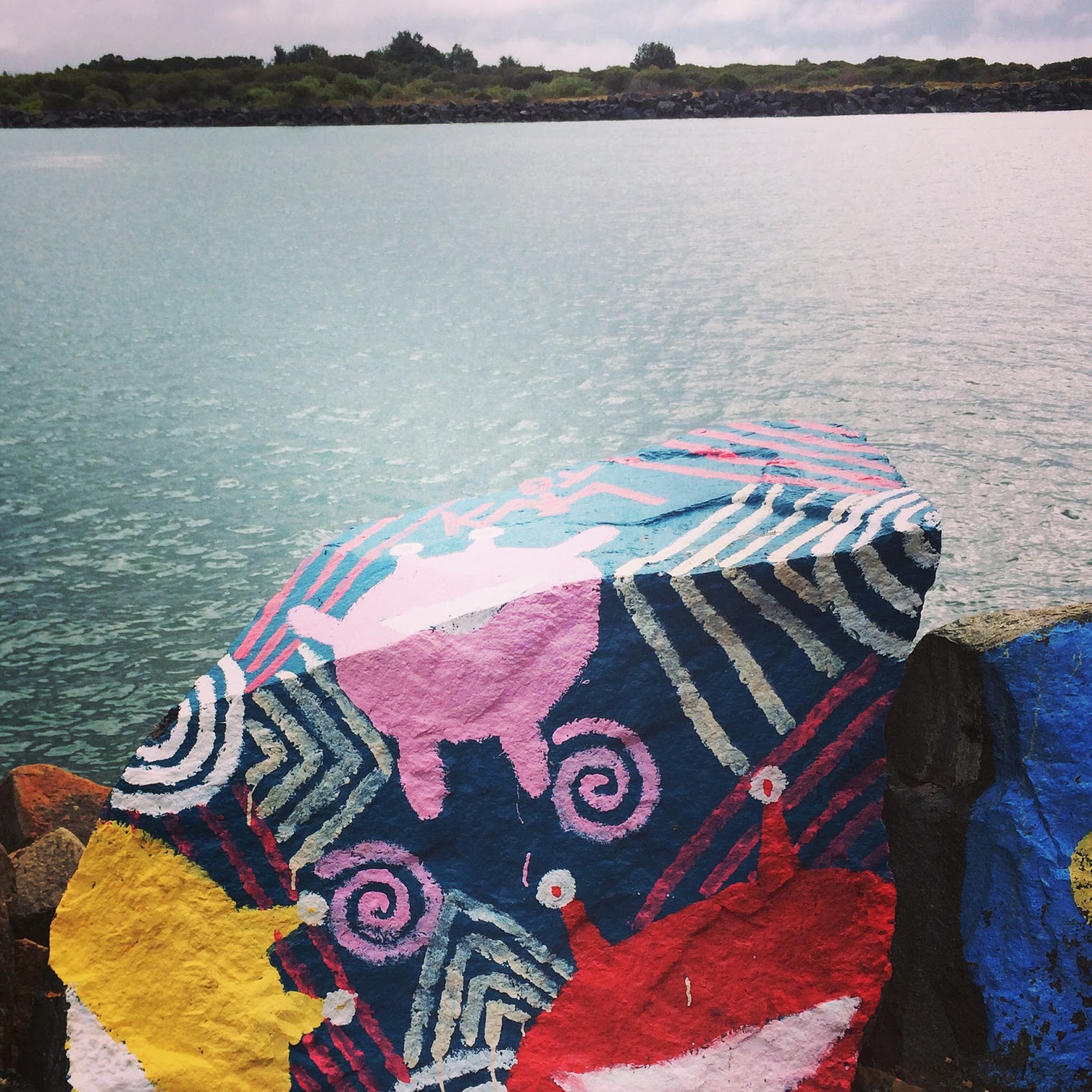 Painted rocks on the walk to Port Macquarie