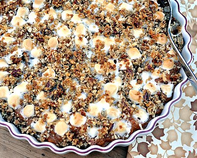 Sweet Potato Casserole ♥ AVeggieVenture.com, traditional sweet potato casserole, updated. Think way-fewer-than-usual mini marshmallows, hints of vanilla and ginger, plus a pecan-panko topping. Delish! Recipe, make-ahead tips, nutrition & WW Weight Watchers points included.