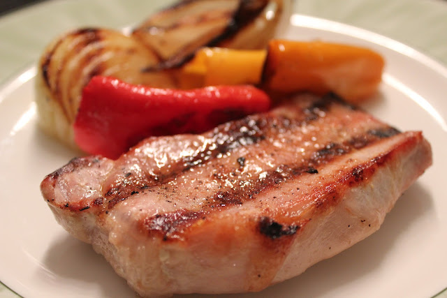 Grilled pork, peppers, and onions