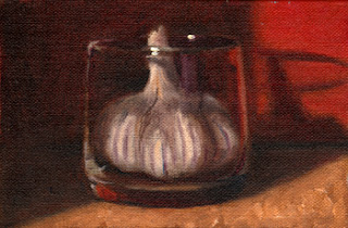 Oil painting of a garlic bulb inside an old fashioned glass with red background.