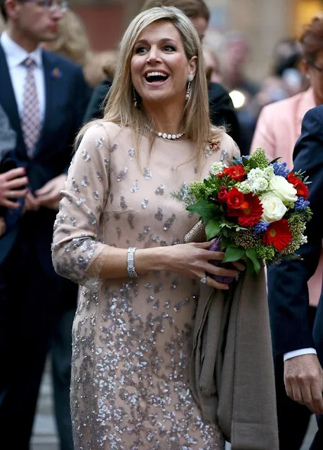 King Willem-Alexander and Queen Maxima of the Netherlands walk across the Marienplatz in Munich, Germany