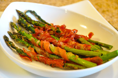 Simple ingredients make the best food and thinly sliced prosciutto wrapped around asparagus make the perfect side dish any time of year, but straight from the grill makes slightly smoky flavored grilled prosciutto wrapped asparagus.