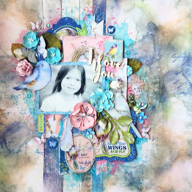 Scraps of Elegance scrapbook kits: pink and blue mixed media layout w/our June Birds of a Feather kit, by Annie Carignan. BoBunny Serendipity. Scraps of Elegance scrapbook kits: pink and blue mixed media layout w/our June Birds of a Feather kit, by Annie Carignan.