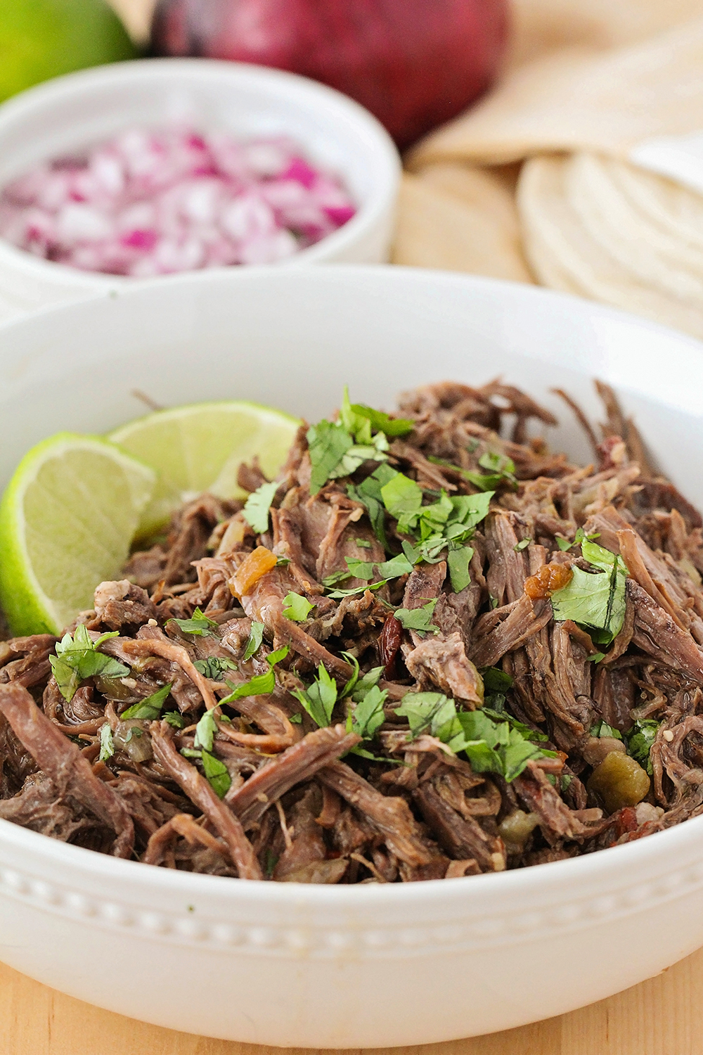 These juicy and flavorful Instant Pot barbacoa tacos are so delicious and easy to make, too!