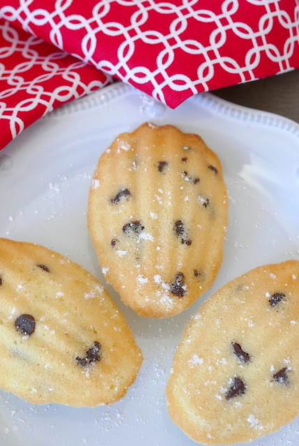 Mini Chocolate Chip Madeleines Recipe from Hot Eats and Cool Reads! These delicious little cake cookies are wonderful for any occasion! We love serving them at holiday parties, for snack or dessert! Also great with mint, butterscotch or white chocolate chips!