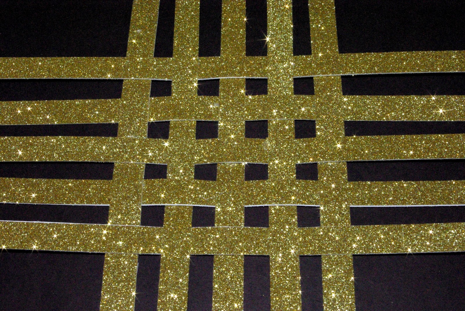 Speciality Paper Star Tree Topper Black and Gold Grid