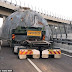 Tension as huge truck gets stuck under a low bridge causing massive traffic
