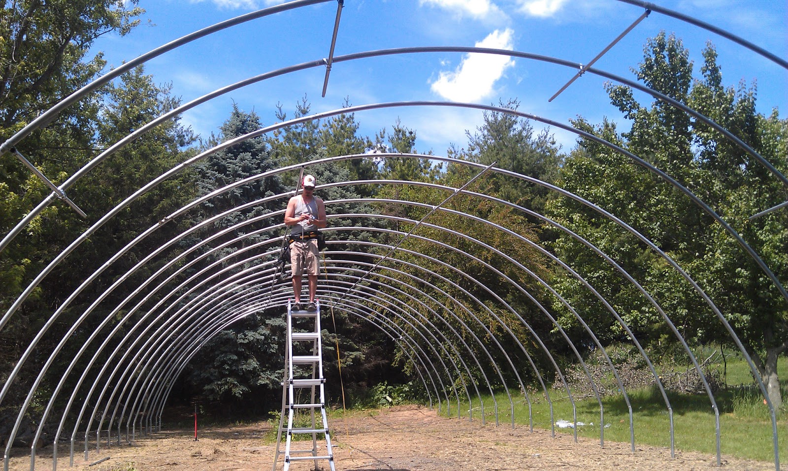 Wishful Acres Farm blog: Greenhouse / hoophouse is UP!!!