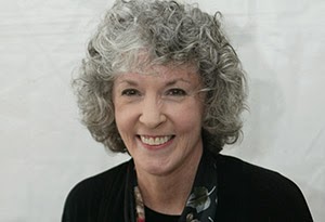 http://es.wikipedia.org/wiki/Sue_Grafton