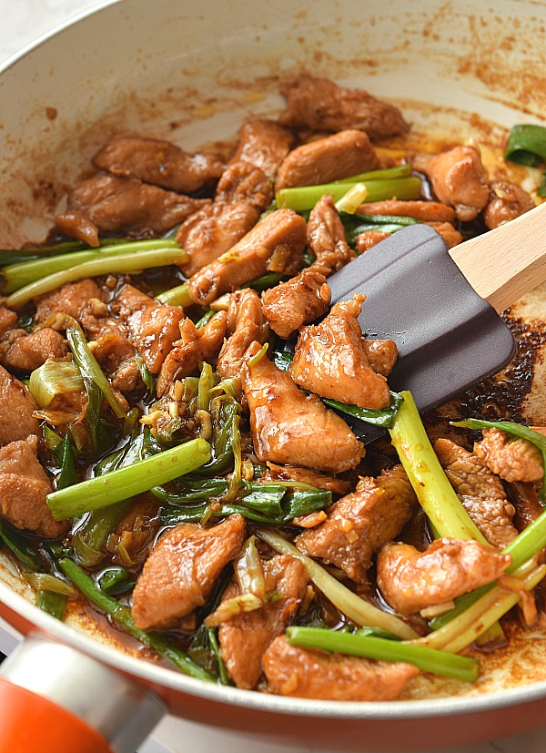 a pan with delicious and easy Mongolian chicken with scallions