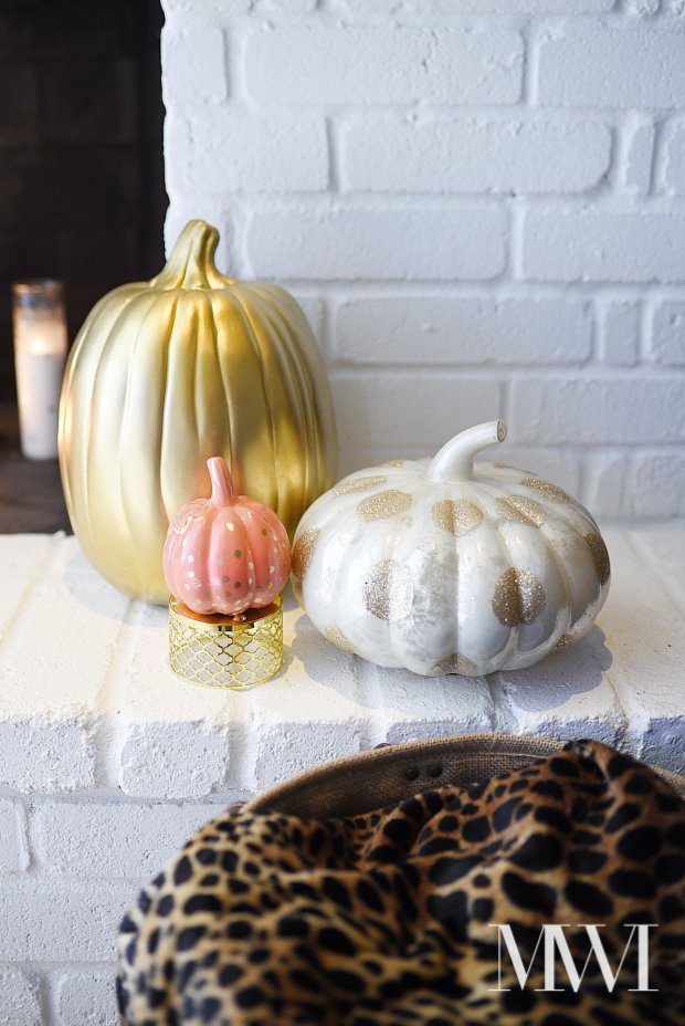 A chic and feminine twist on fall decor. Lots of gold glam touches mixed with coral and other metallics.