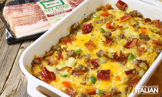 Fully Loaded Cheesy Breakfast Casserole baked eggs with sausage, bacon, cheese, and hash browns in casserole dish