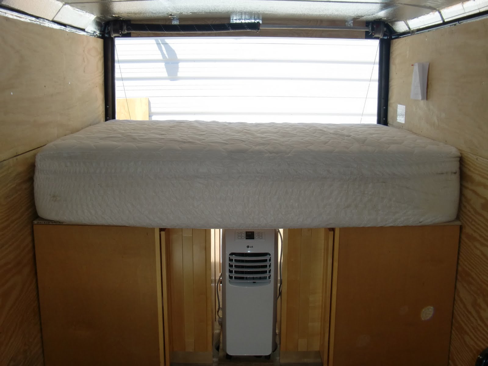 2013 CarMate 100 Solar Heated and Cooled Over The Top Cargo Trailer