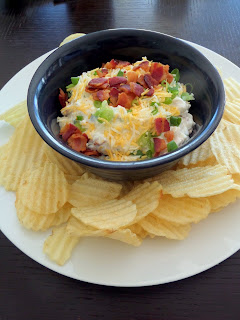 Loaded Baked Potato Dip:  A dip made with sour cream, green onions, cheese, and bacon bits.  It's like a loaded baked potato on a chip.  #footballsnack #gamedaysnack