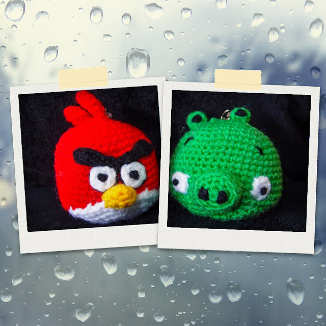 crocheted red angry bird and green pig amigurumi
