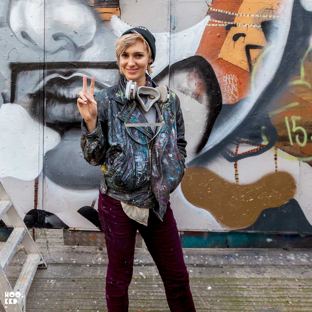 American street artist ELLE paints a Murals in East London while visiting the city.
