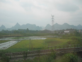 view of mountains from high-speed train