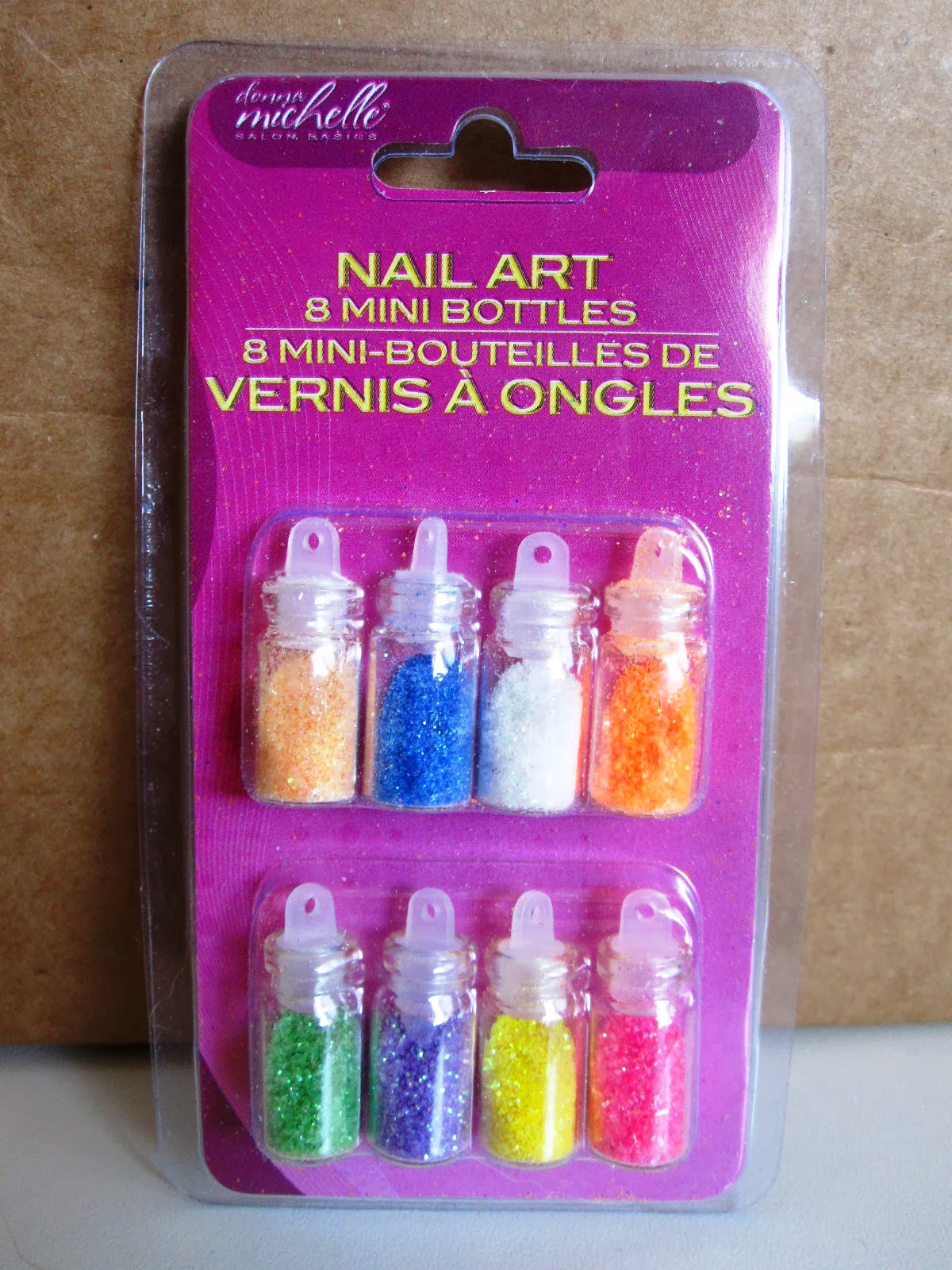 Set of eight nail arts miniature bottles, each a different colour