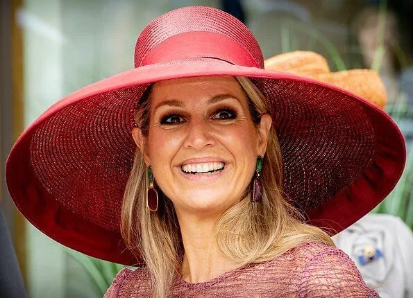 Queen Maxima's dress is by Belgian fashion house Natan