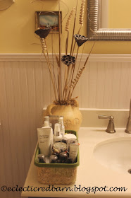 Eclectic Red Barn: Decorated Swiffer container with skin products on counter