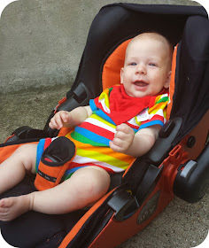 kiddy car seat, infant car seat, orange baby car seat